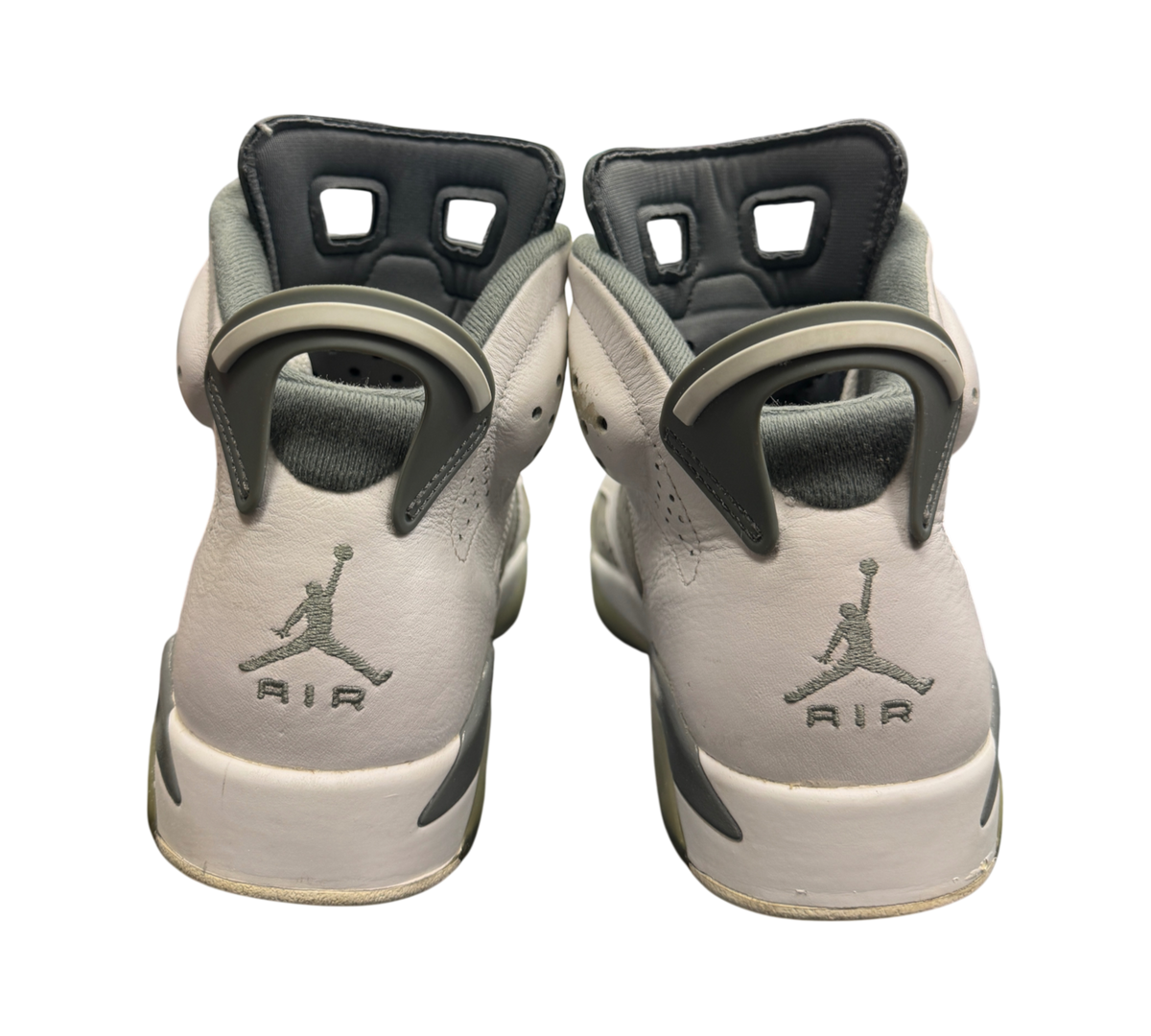 Genesis Boutique Jordan 6 Cool Grey sneakers showing the white leather heels and grey Jumpman Air branding