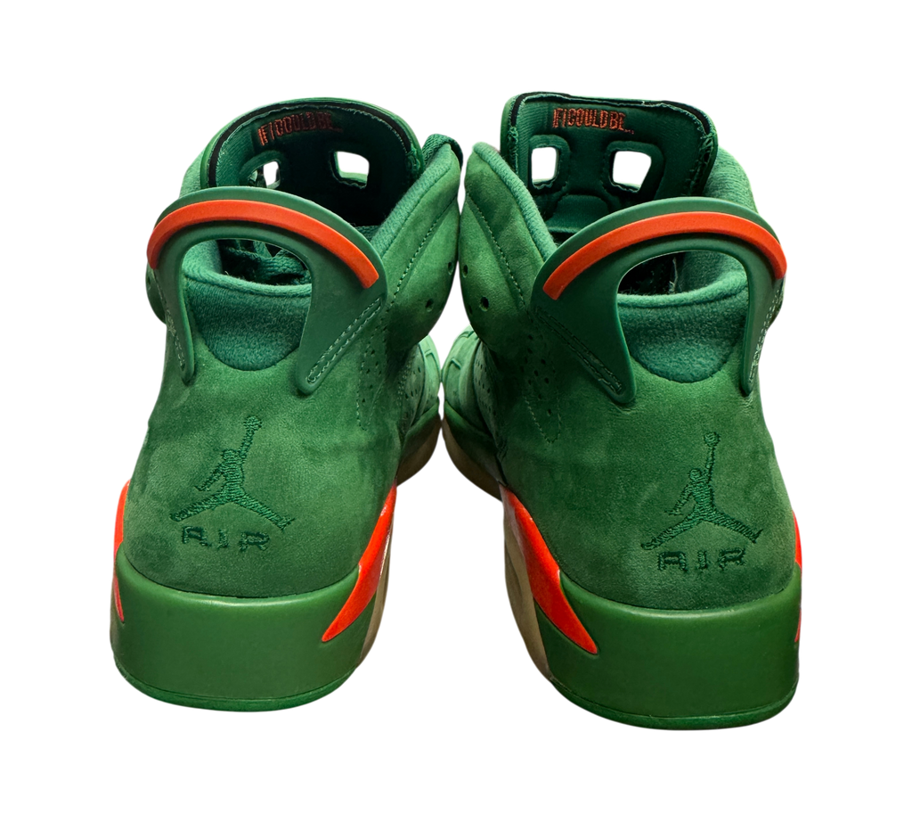Genesis Boutique used Jordan 6 Gatorade Green sneakers showing the suede heel, orange accents, and Jumpman logo.