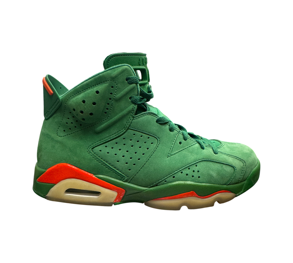 Genesis Boutique Jordan 6 Gatorade Green sneakers in suede with orange accents and yellowed soles, side profile view.
