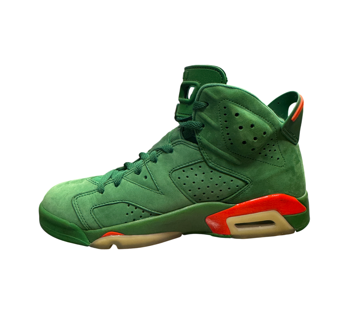 Genesis Boutique Jordan 6 Gatorade Green sneakers in suede with orange accents and yellowed soles, side profile view.
