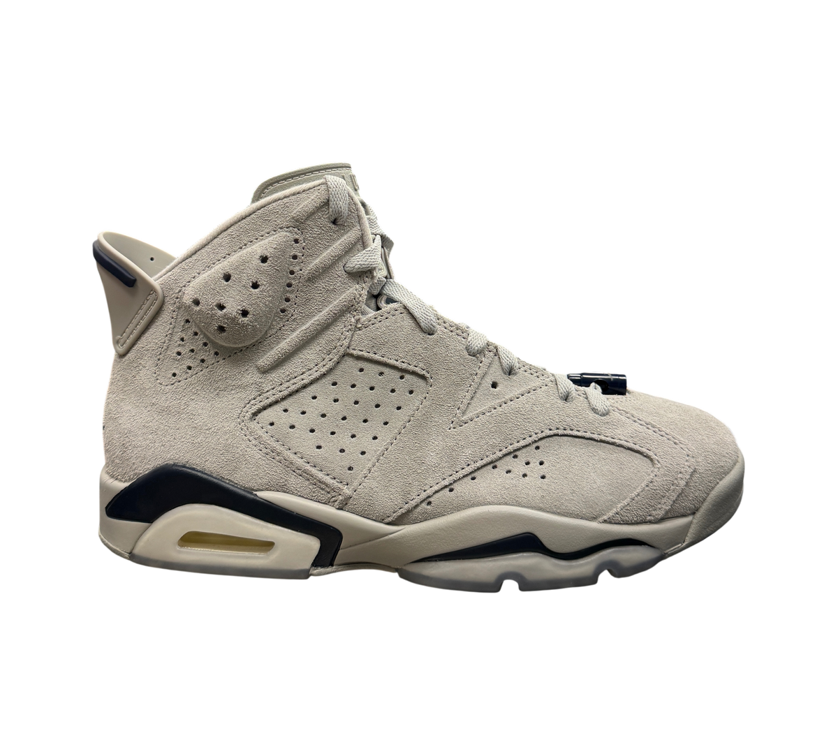 Genesis Boutique Jordan 6 Georgetown sneakers in grey suede with navy blue accents on a glass display shelf