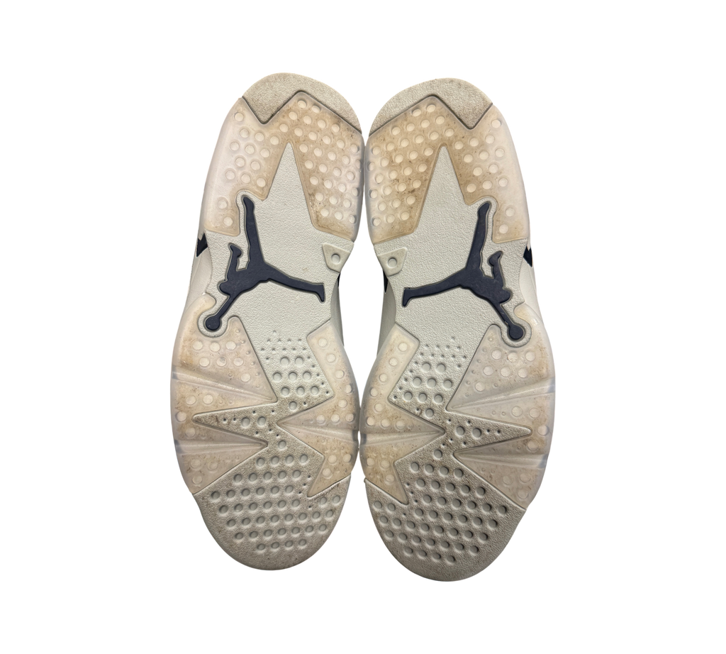 Genesis Boutique used Jordan 6 Georgetown sneakers showing the translucent rubber outsoles with Jumpman branding