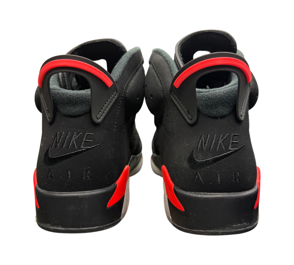 Genesis Boutique Jordan 6 Infrared 2018 sneakers showing the black nubuck heels with red accents and Nike Air branding