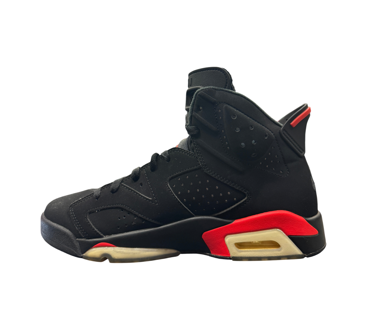 Genesis Boutique Jordan 6 Infrared 2018 sneakers in black nubuck with red accents and translucent yellowed soles.