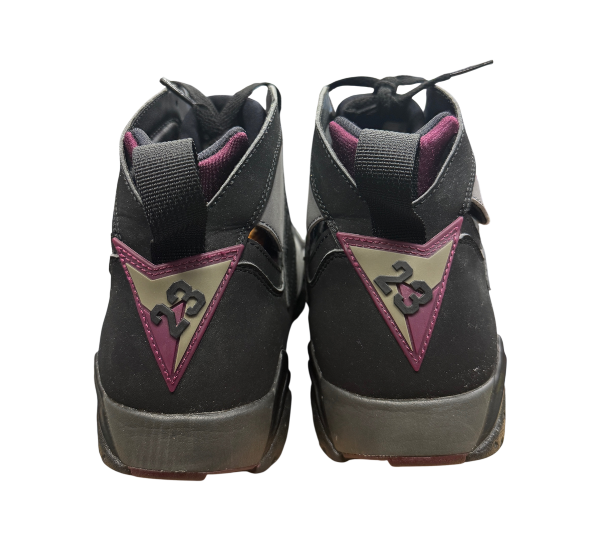 Genesis Boutique Jordan 7 Bordeaux sneakers showing the black and maroon heel detail and 23 branding