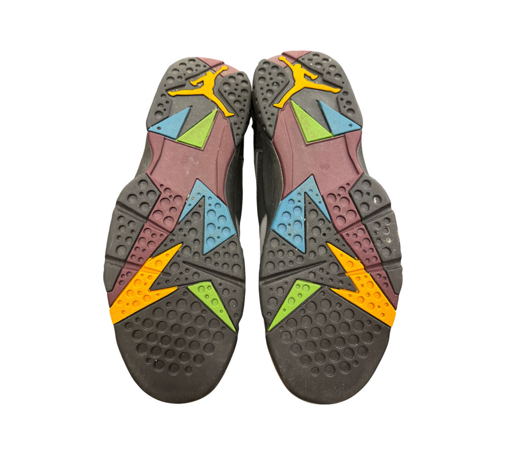 Genesis Boutique Jordan 7 Bordeaux sneaker outsoles featuring multi-colored geometric patterns in black, yellow, and blue