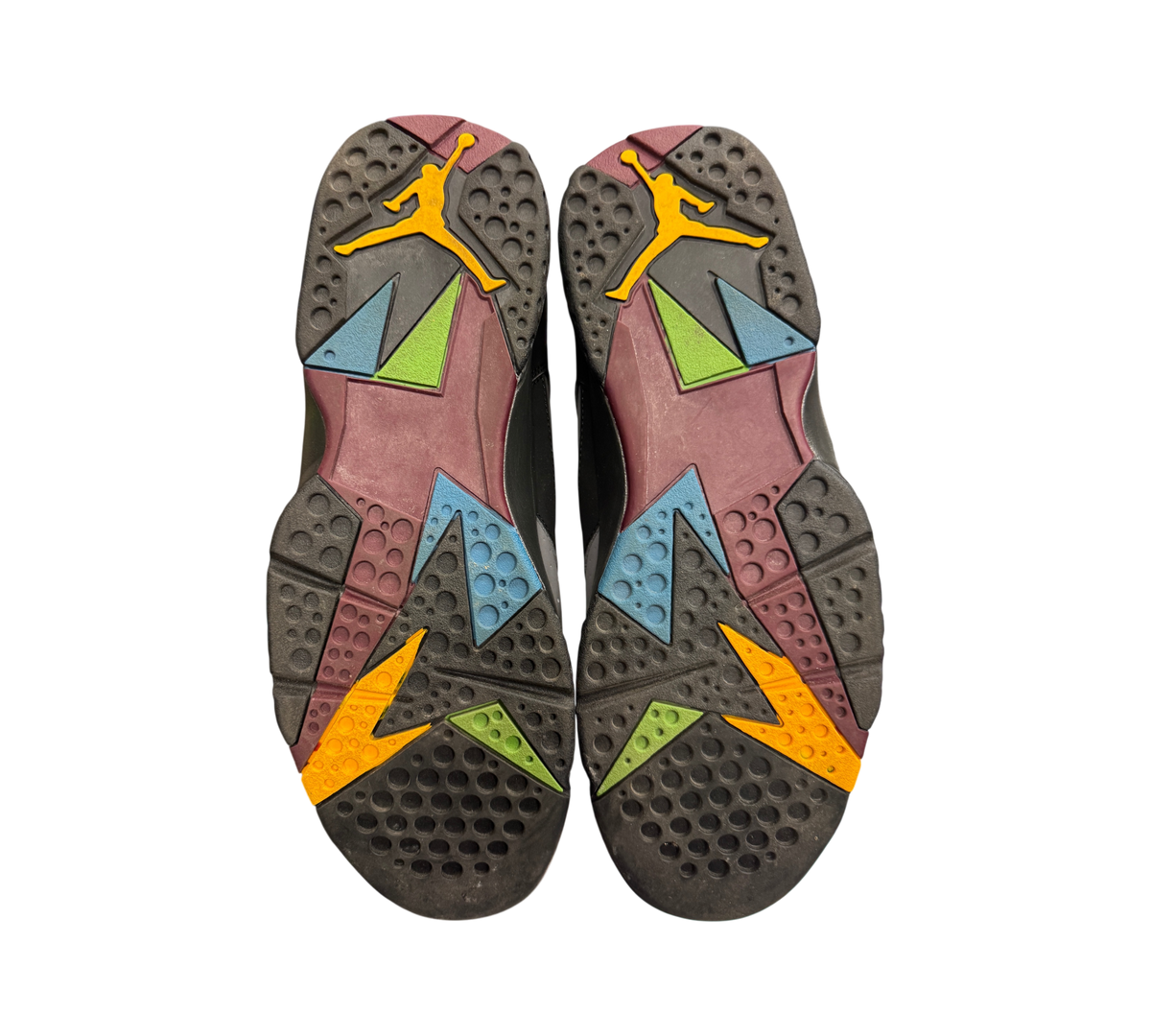 Genesis Boutique used Jordan 7 Bordeaux sneakers showing the multi-colored rubber outsoles with Jumpman branding.