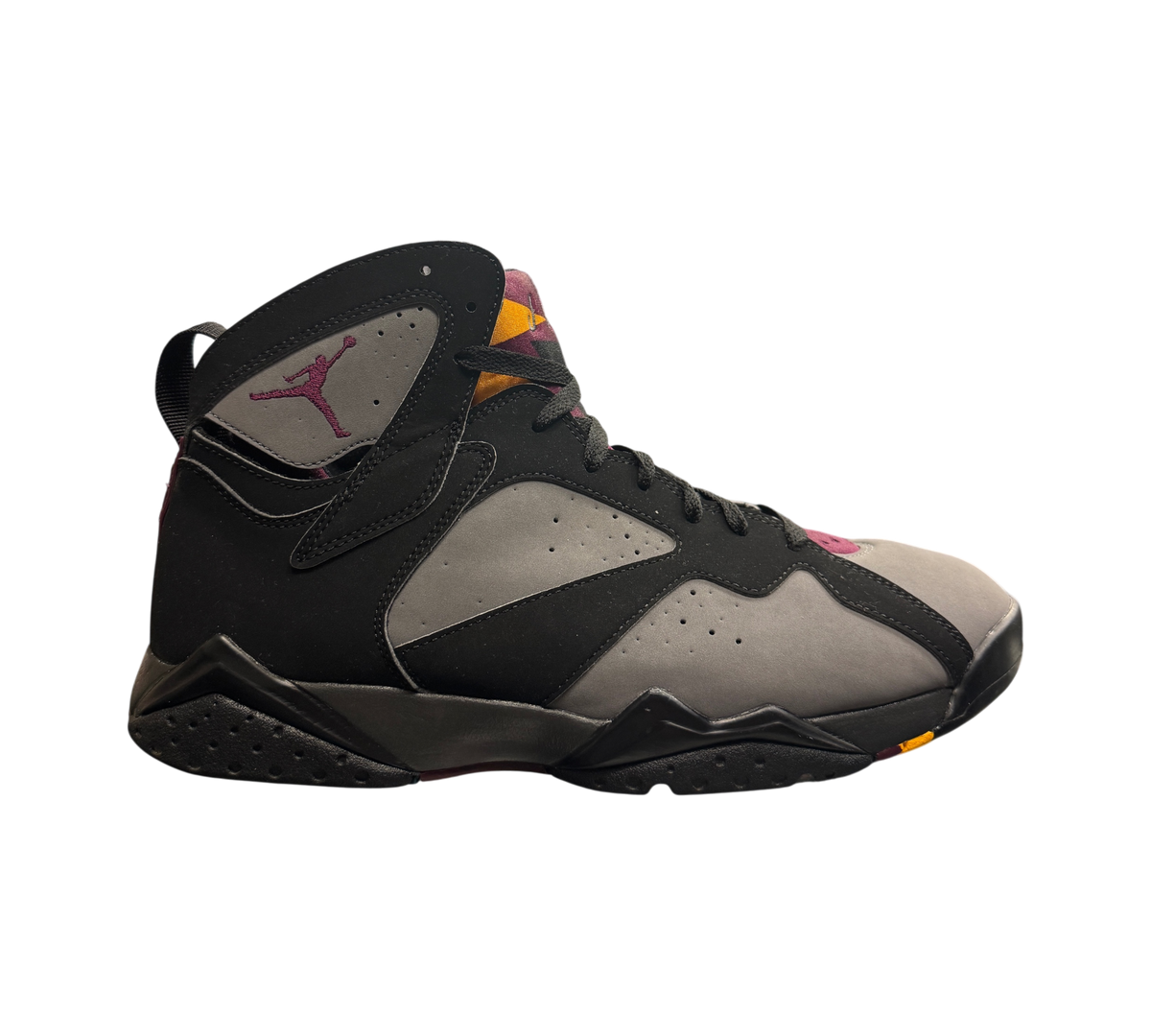 Genesis Boutique Jordan 7 Bordeaux sneakers in black and grey with purple accents, side profile view.