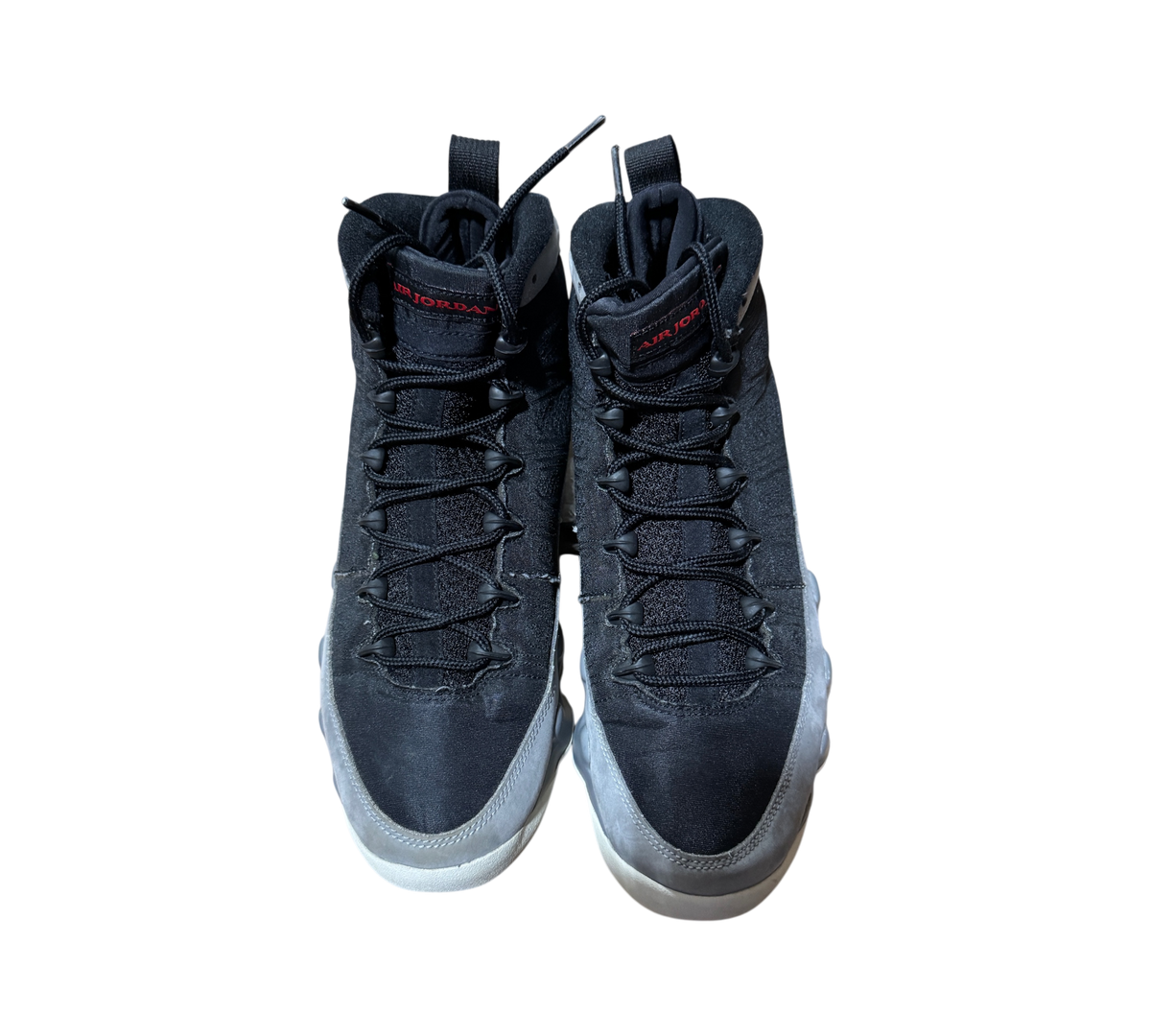 Genesis Boutique pre-owned Jordan 9 Particle Grey high-top sneakers in black and grey with red tongue branding