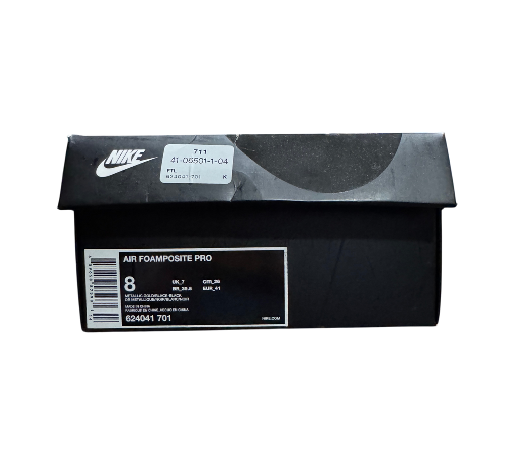 Genesis Boutique Nike Air Foamposite 1 Gold sneaker box with size 8 label and product details