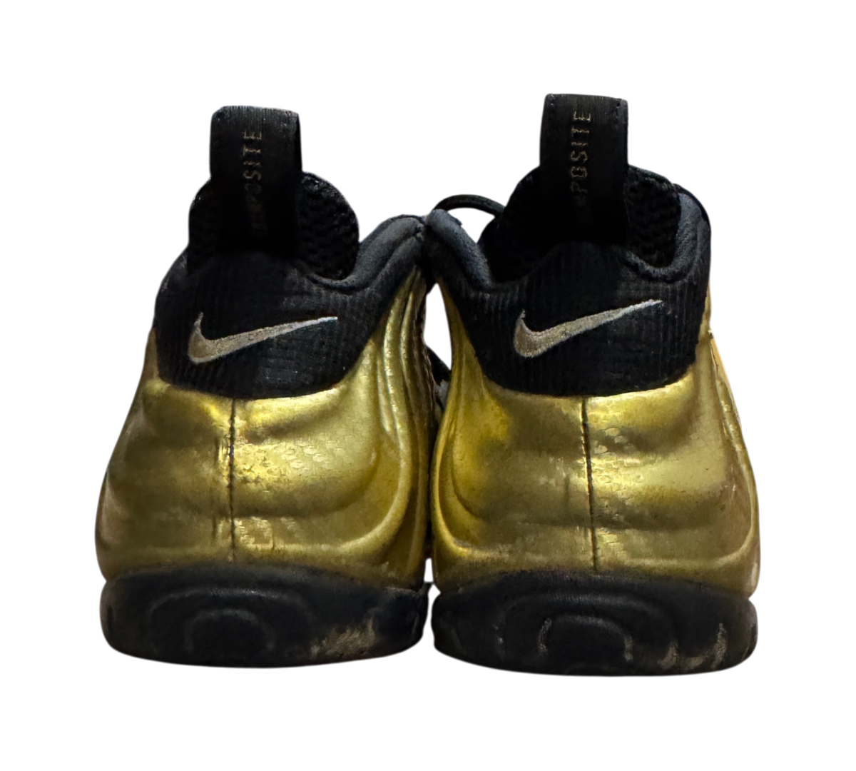 Genesis Boutique used Nike Air Foamposite 1 Gold sneakers showing the metallic gold heel and black detailing