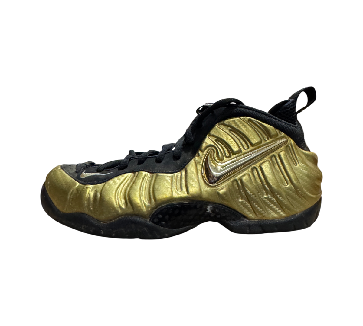 Genesis Boutique pre-owned Nike Air Foamposite 1 sneakers in metallic gold and black with signature molded shell design