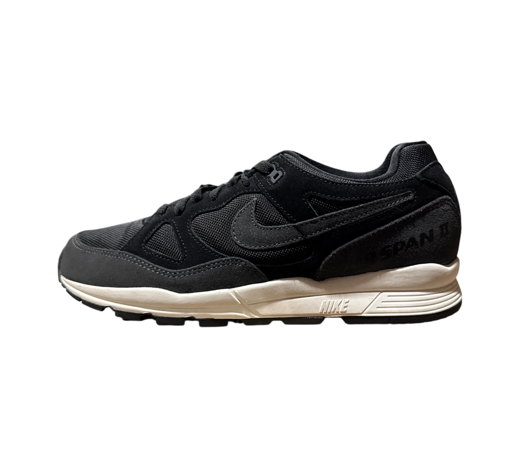 Genesis Boutique Nike Air Span II sneakers in black and anthracite with a white midsole, side profile view.