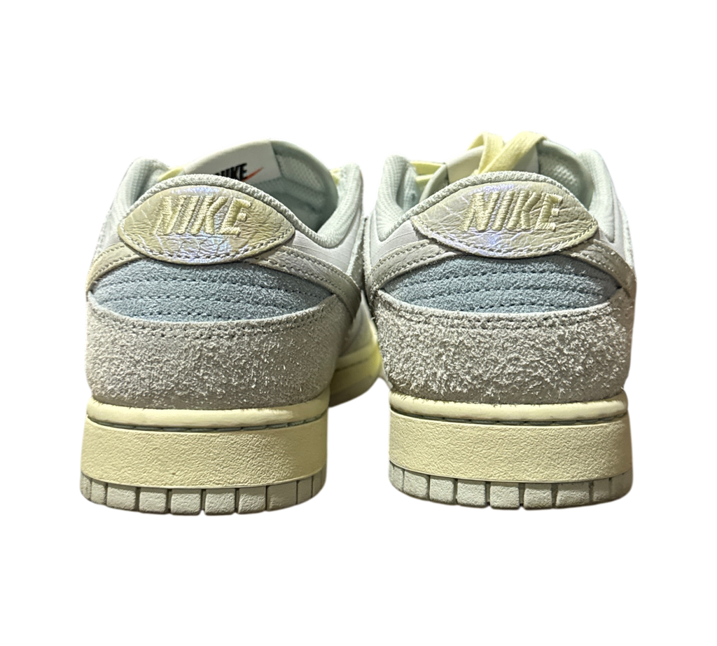 Genesis Boutique Nike Dunk Low Gone Fishing Chinook Salmon sneakers showing the textured heel and branding details.