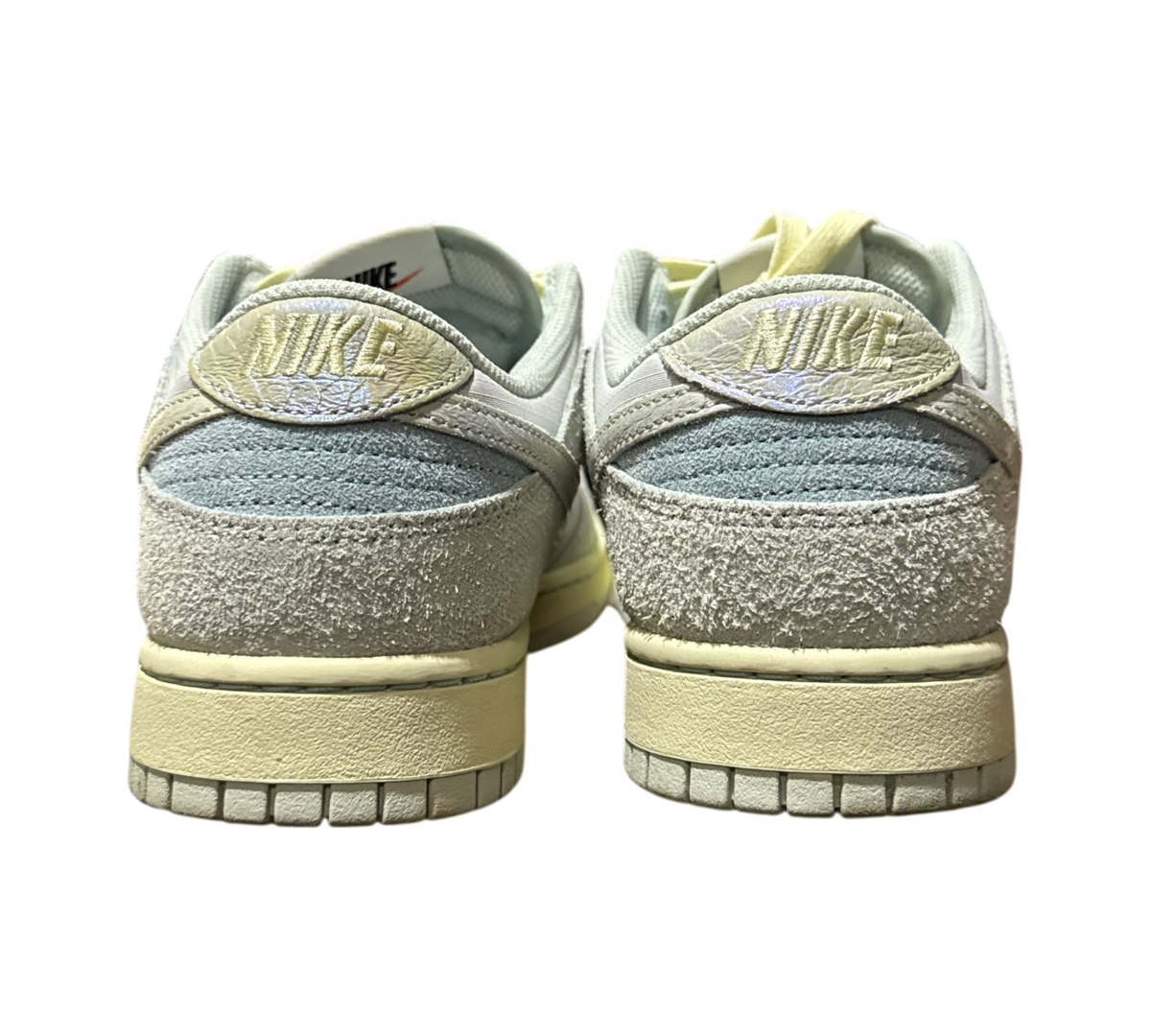 Genesis Boutique Nike Dunk Low Gone Fishing Chinook Salmon sneakers showing the textured heel and branding details.