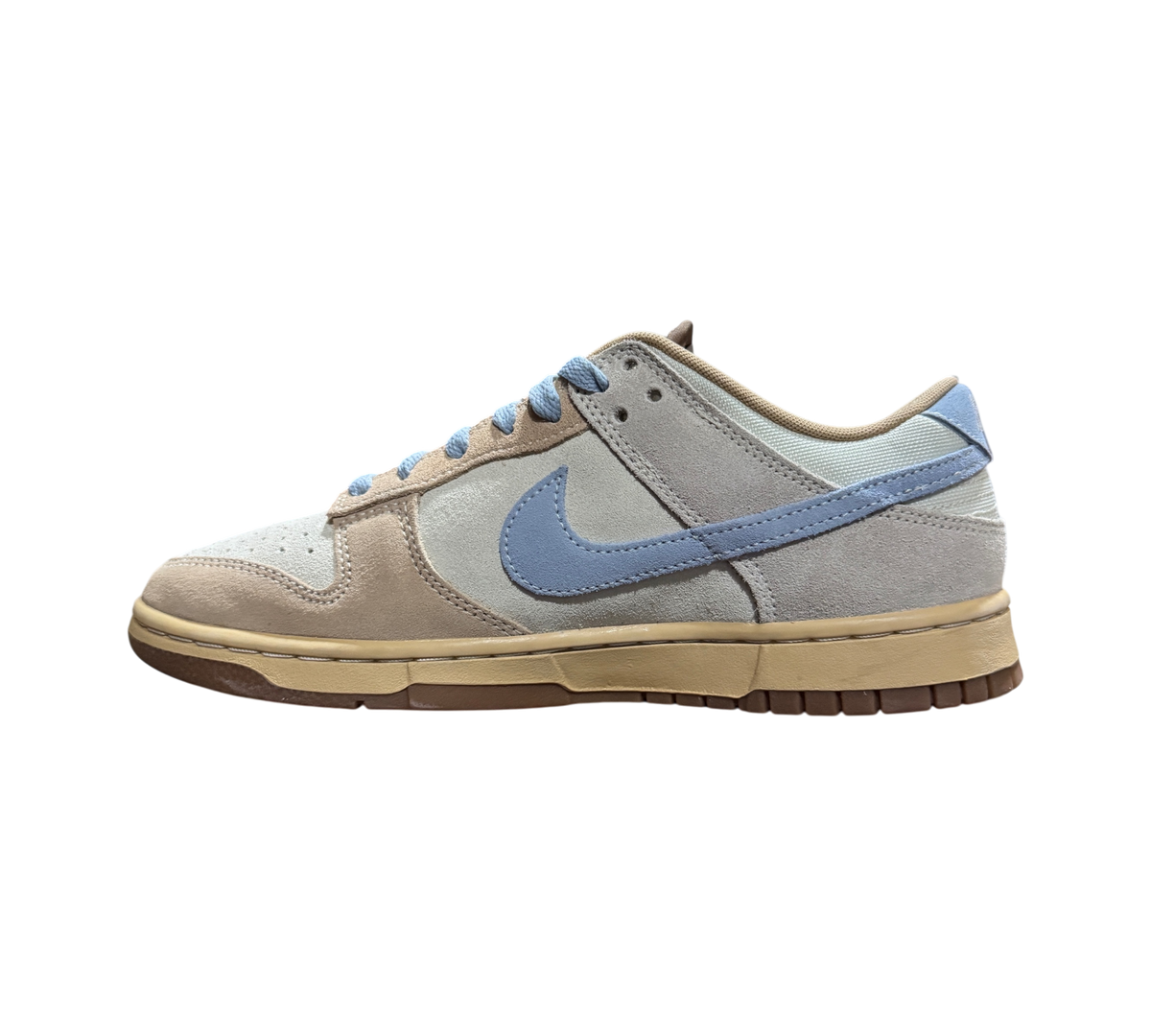 Genesis Boutique Nike Dunk Low Sanddrift Light Armory Blue sneakers in suede with a side profile view
