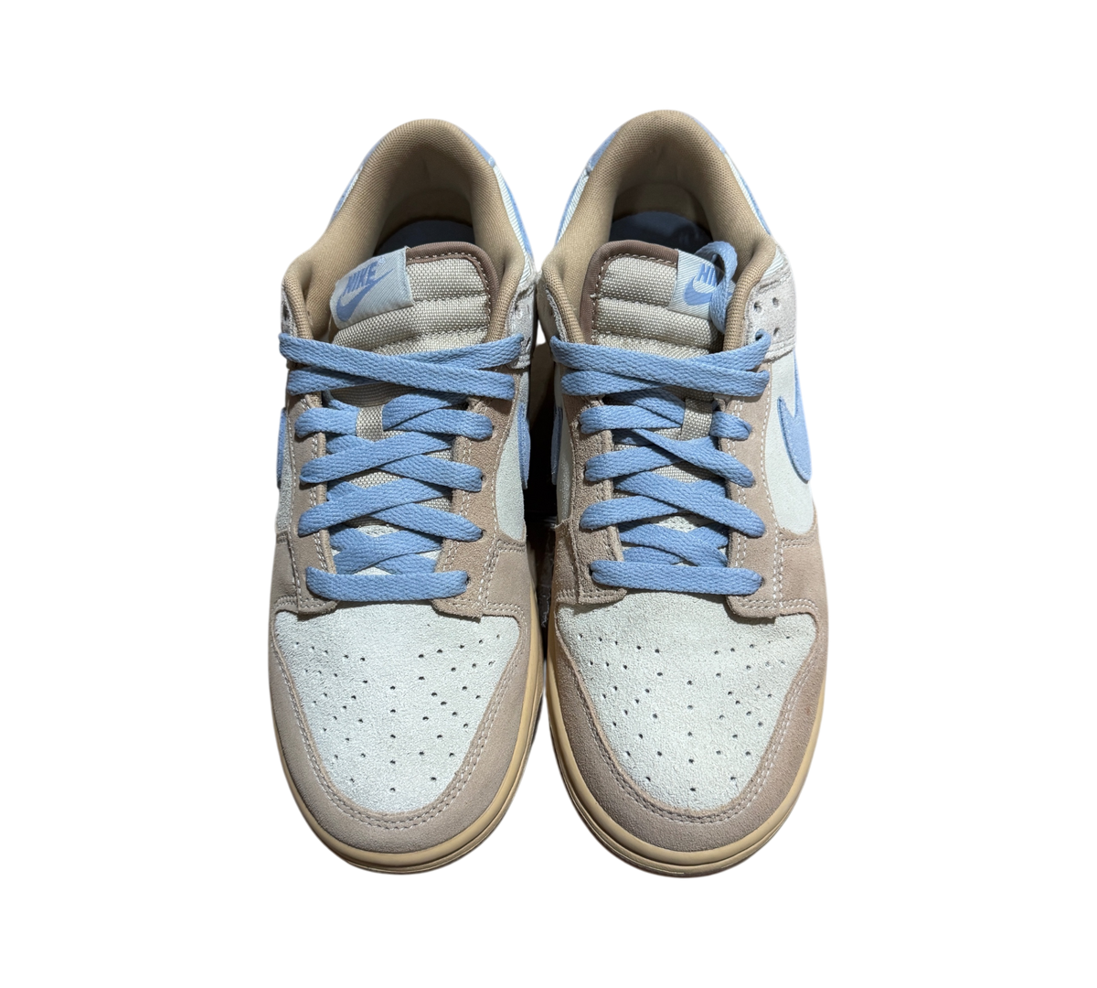 Genesis Boutique Nike Dunk Low Sanddrift Light Armory Blue sneakers with suede overlays and light blue laces
