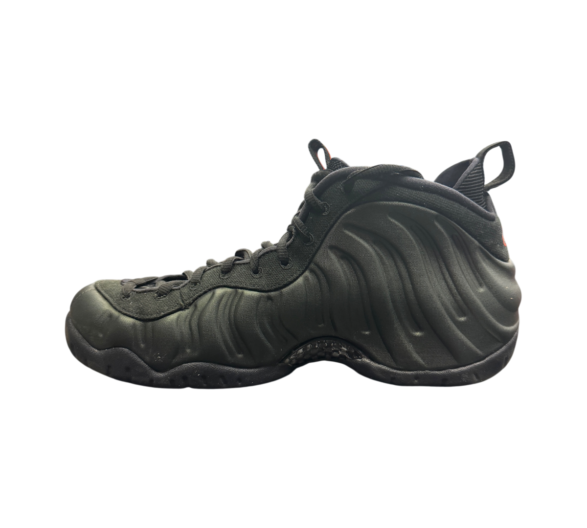 Genesis Boutique Nike Foamposite Pro Sequoia sneakers in dark green with black accents on a display box