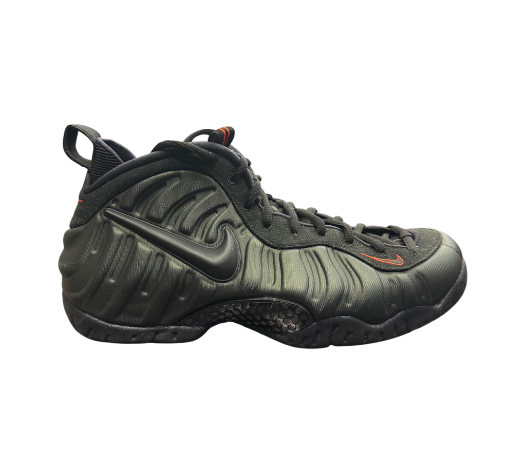 Genesis Boutique Nike Foamposite Pro Sequoia sneakers in dark olive green with black accents and carbon fiber detail.