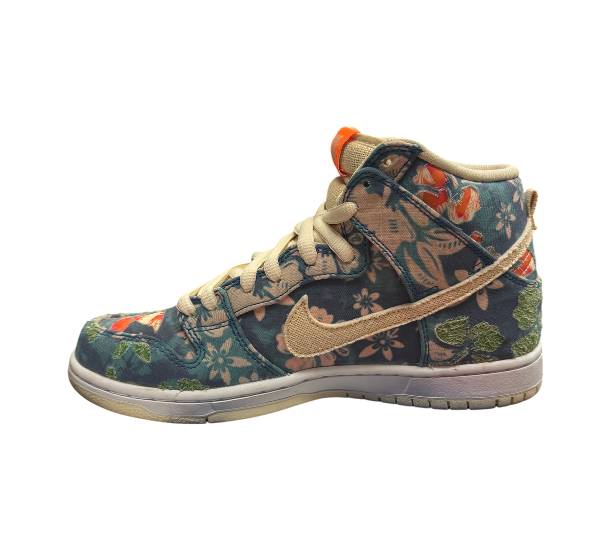 Genesis Boutique used Nike SB Dunk High Hawaii sneakers with floral canvas upper and torn patches on a Nike box
