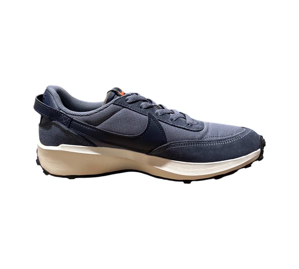 Genesis Boutique used Nike Waffle Debut SE sneakers in light carbon and obsidian with a thick white midsole.