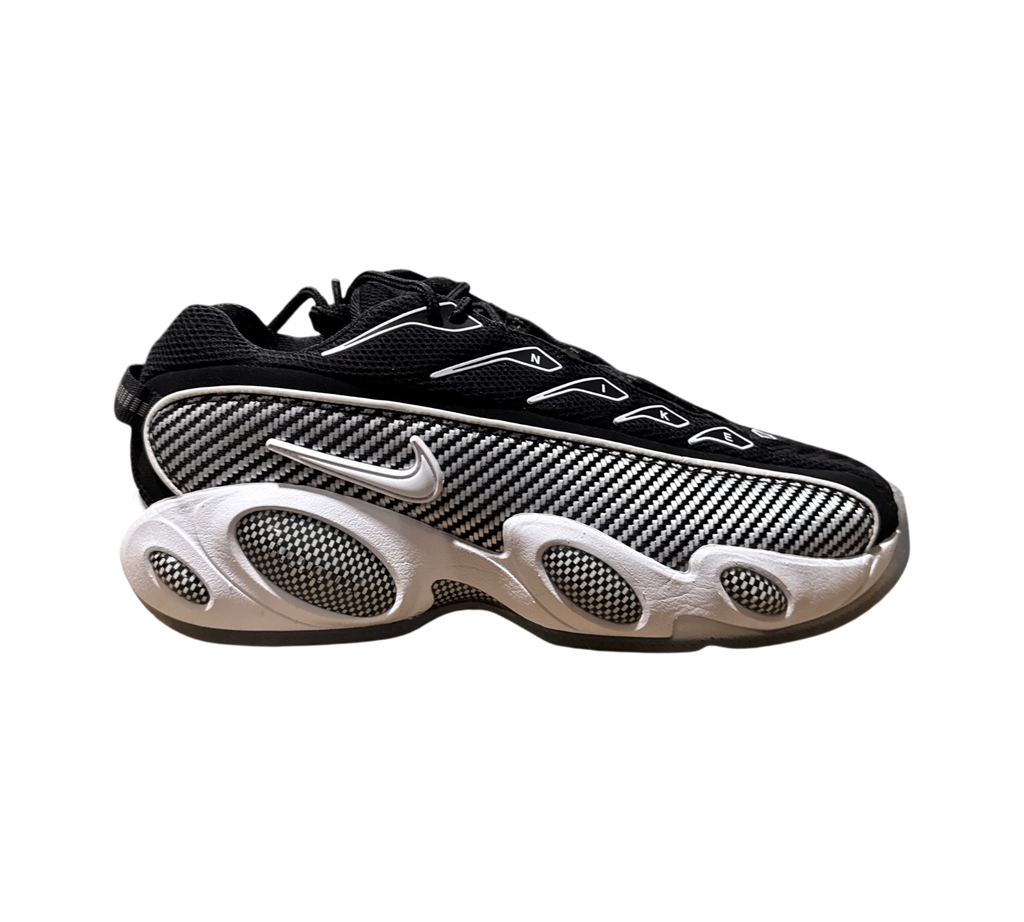 Genesis Boutique NOCTA x Nike Glide sneakers in black and white with carbon fiber pattern and white midsole