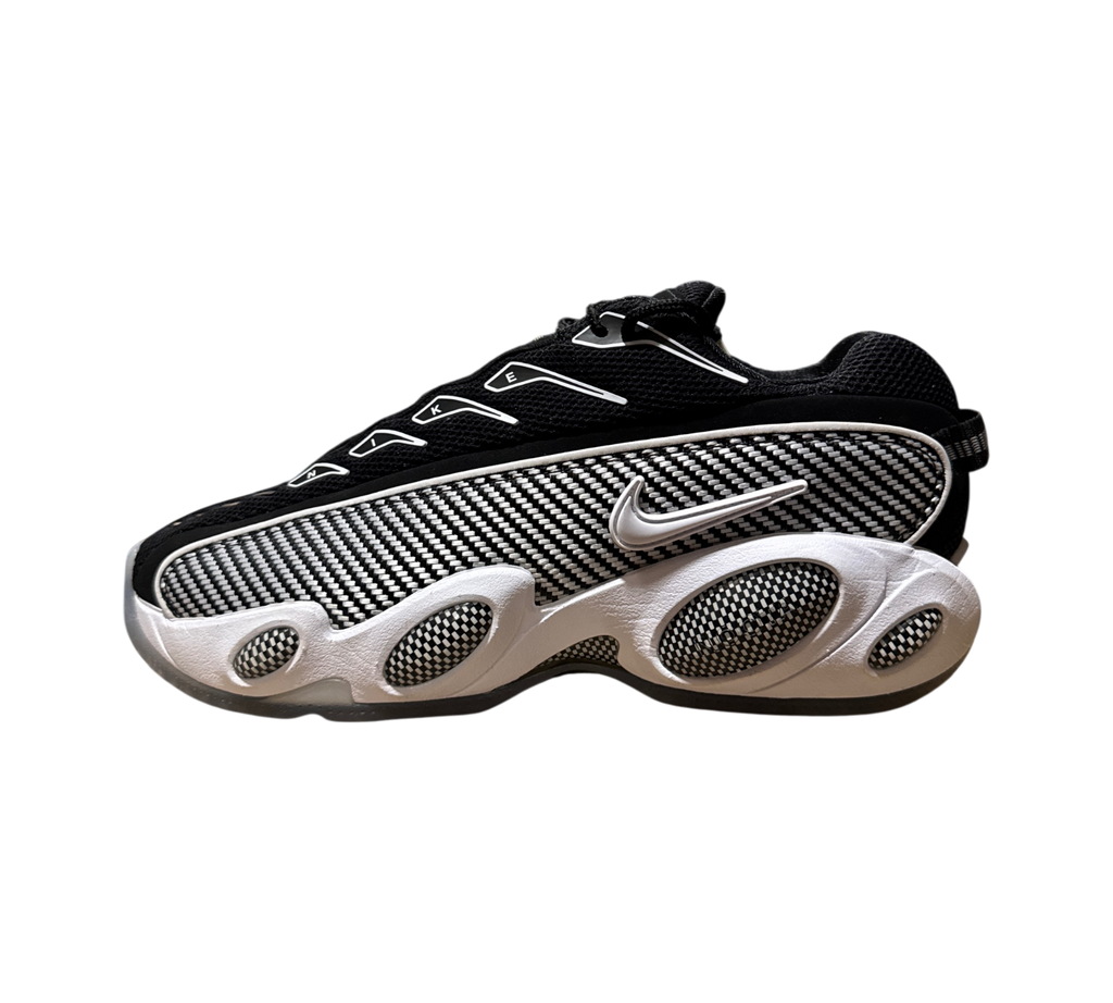 Genesis Boutique pre-owned Nike Glide x NOCTA sneakers in black and white with carbon fiber pattern side panels