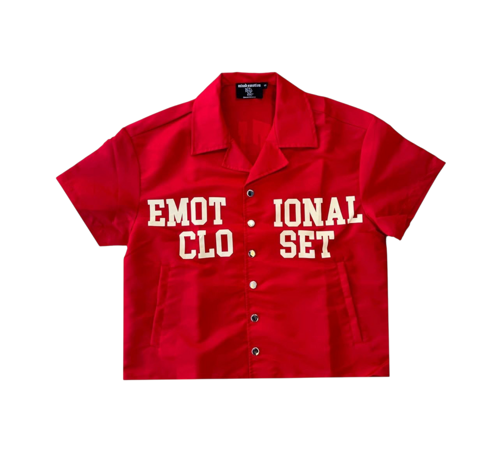 Genesis Boutique red nylon Backyard t-shirt with a camp collar, button-down front, and white graphic lettering.