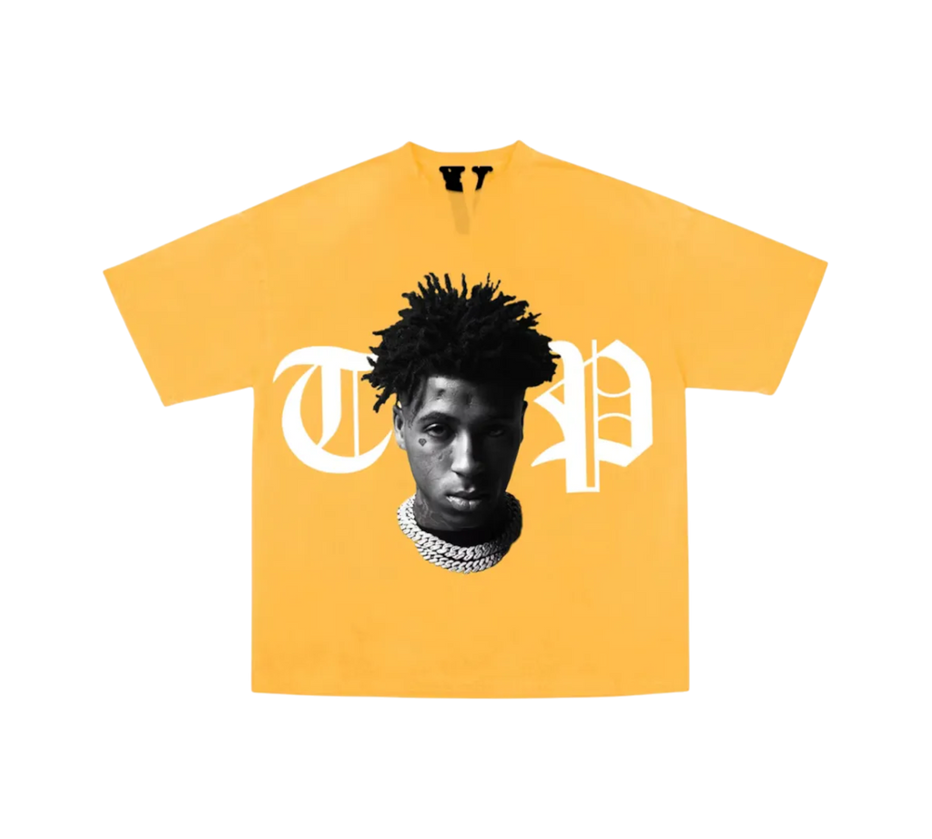 Genesis Boutique yellow cotton t-shirt with NBA YoungBoy graphic and white 'Trap' lettering. Fitted style.