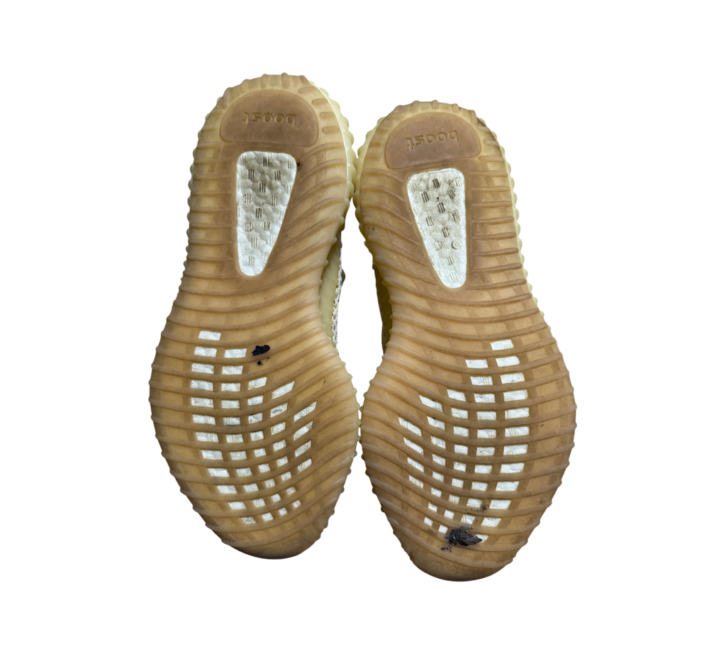 Genesis Boutique used Yeezy 350 Linen sneakers showing the gum rubber outsoles with visible Boost cushioning