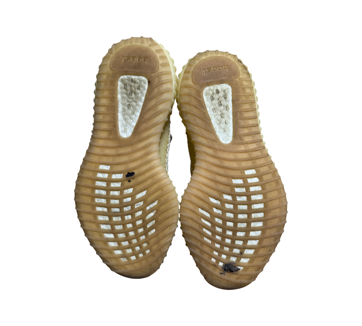 Genesis Boutique used Yeezy 350 Linen sneakers showing the gum rubber outsoles with visible Boost cushioning