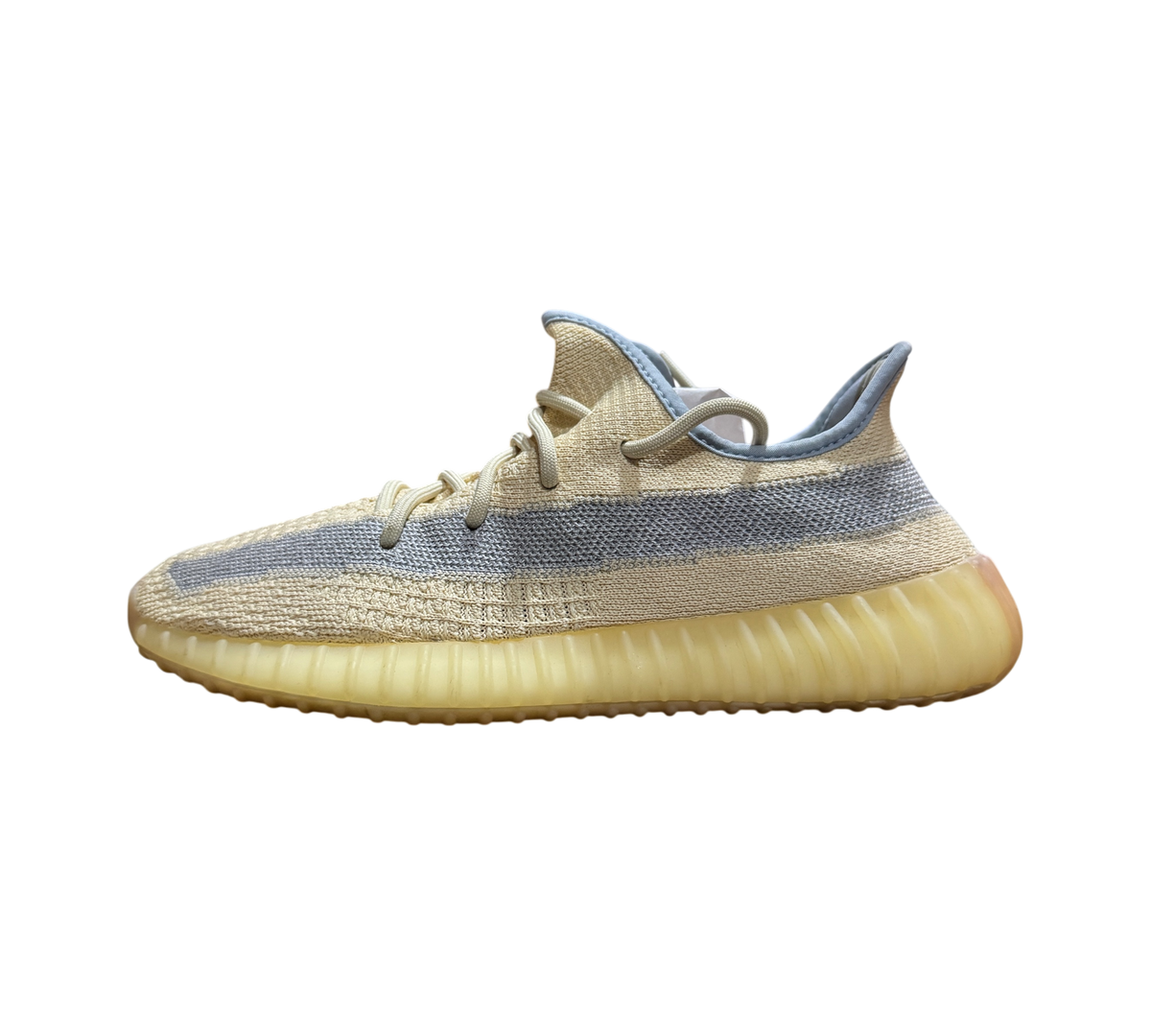 Genesis Boutique used Yeezy 350 Linen sneakers featuring a light yellow Primeknit upper and grey side stripe
