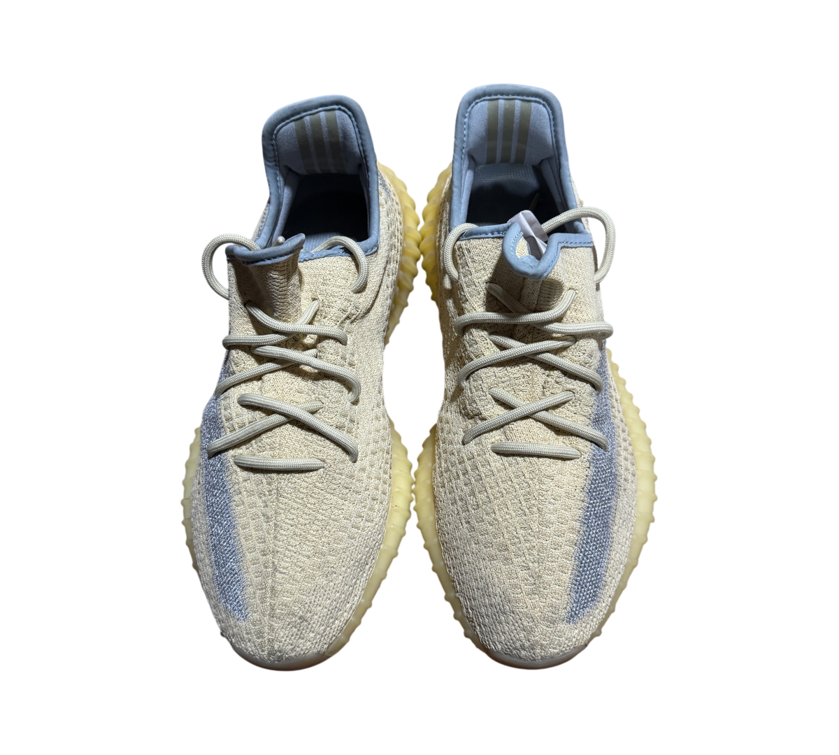 Genesis Boutique pre-owned Yeezy 350 Linen sneakers featuring a pale yellow knit upper and grey side stripe