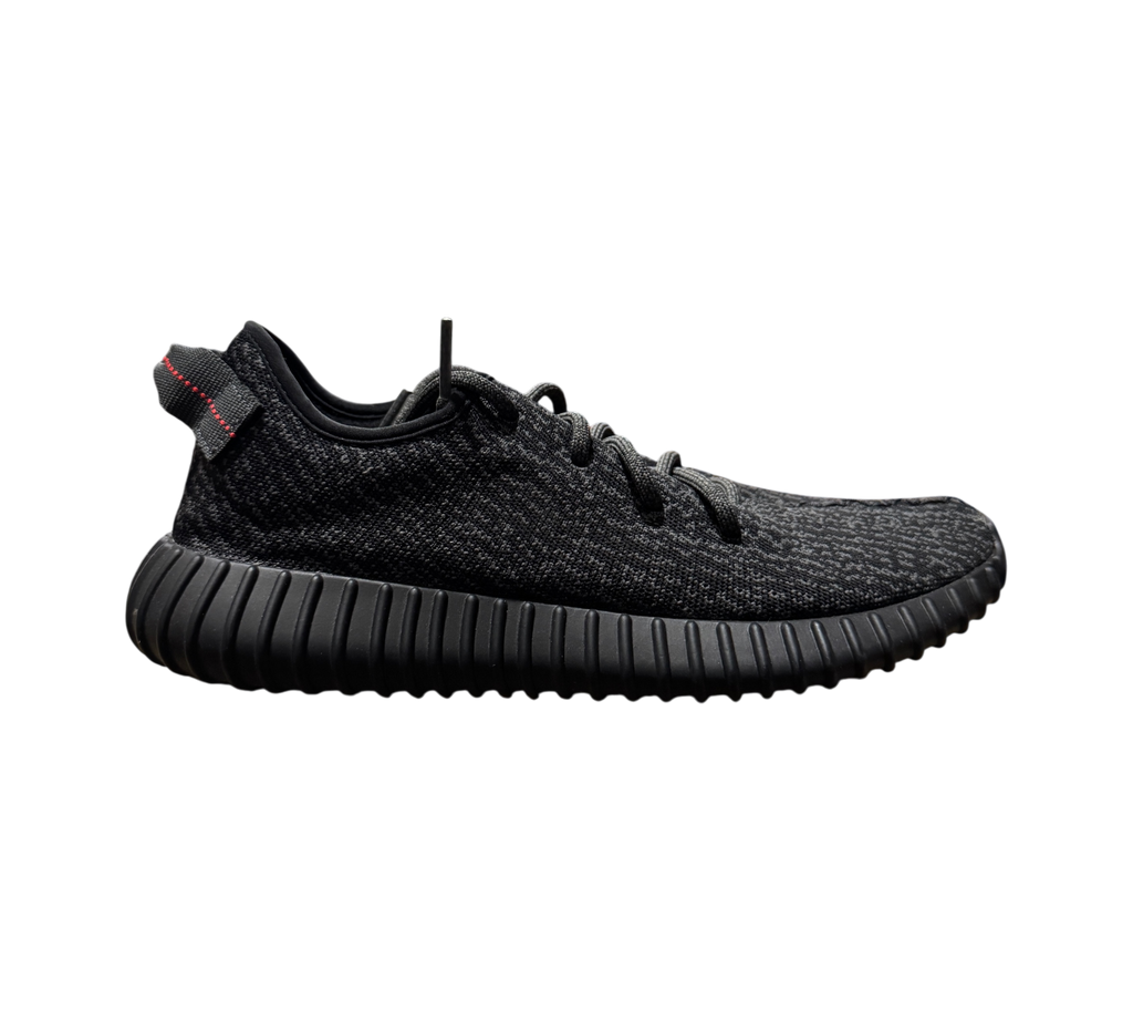 Genesis Boutique Yeezy 350 Pirate Black 2023 sneaker with black Primeknit upper and red heel tab stitching
