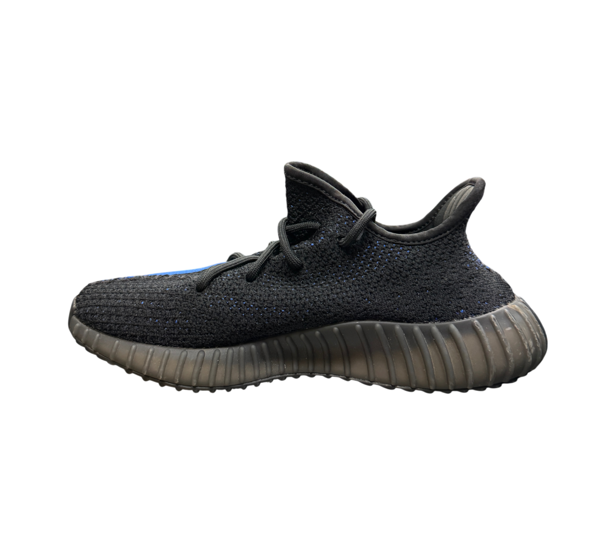 Genesis Boutique Yeezy 350 V2 Dazzling Blue sneaker in black knit with blue stripe detail on a glass display table
