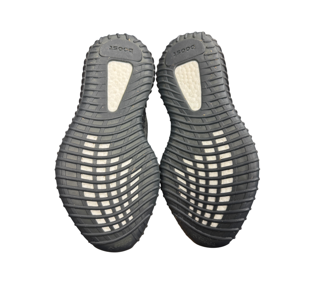 Genesis Boutique used Yeezy 350 V2 MX Dark Salt sneakers showing the black rubber outsoles with white Boost cushioning