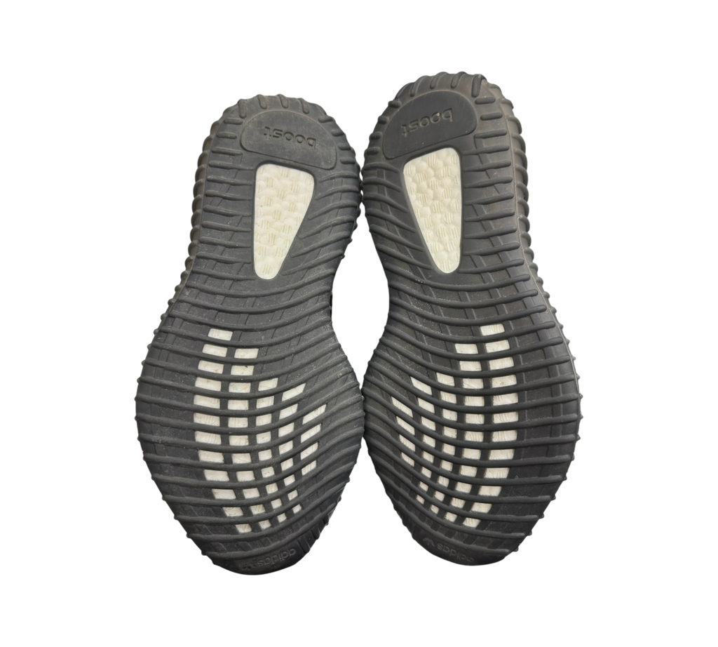 Genesis Boutique used Yeezy 350 V2 Dazzling Blue sneakers showing black rubber outsoles with white Boost cushioning