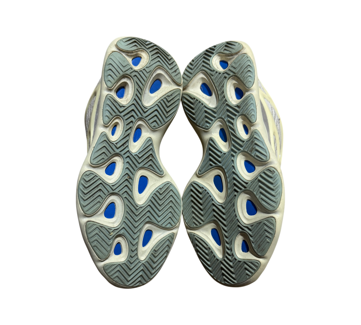 Genesis Boutique used Yeezy 700 Azael sneakers showing the cream and blue patterned rubber outsoles