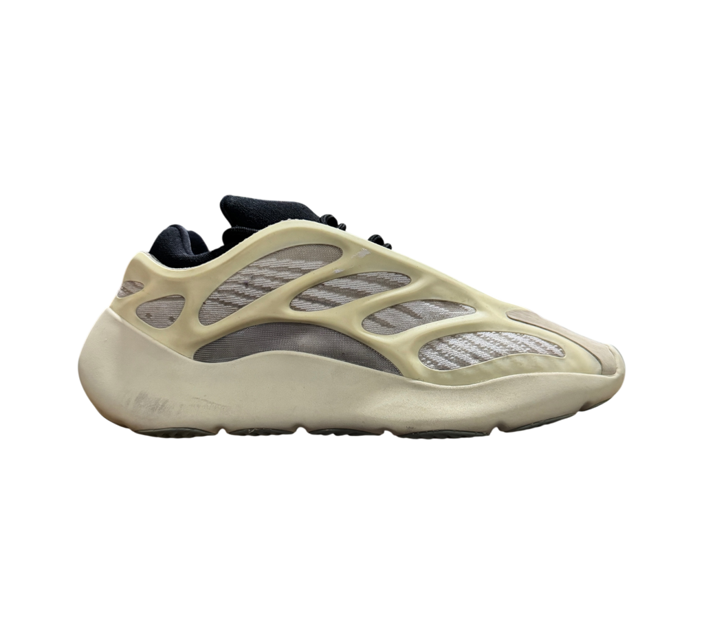 Genesis Boutique used Yeezy 700 Azael sneakers featuring a cream-colored cage overlay and black interior lining.