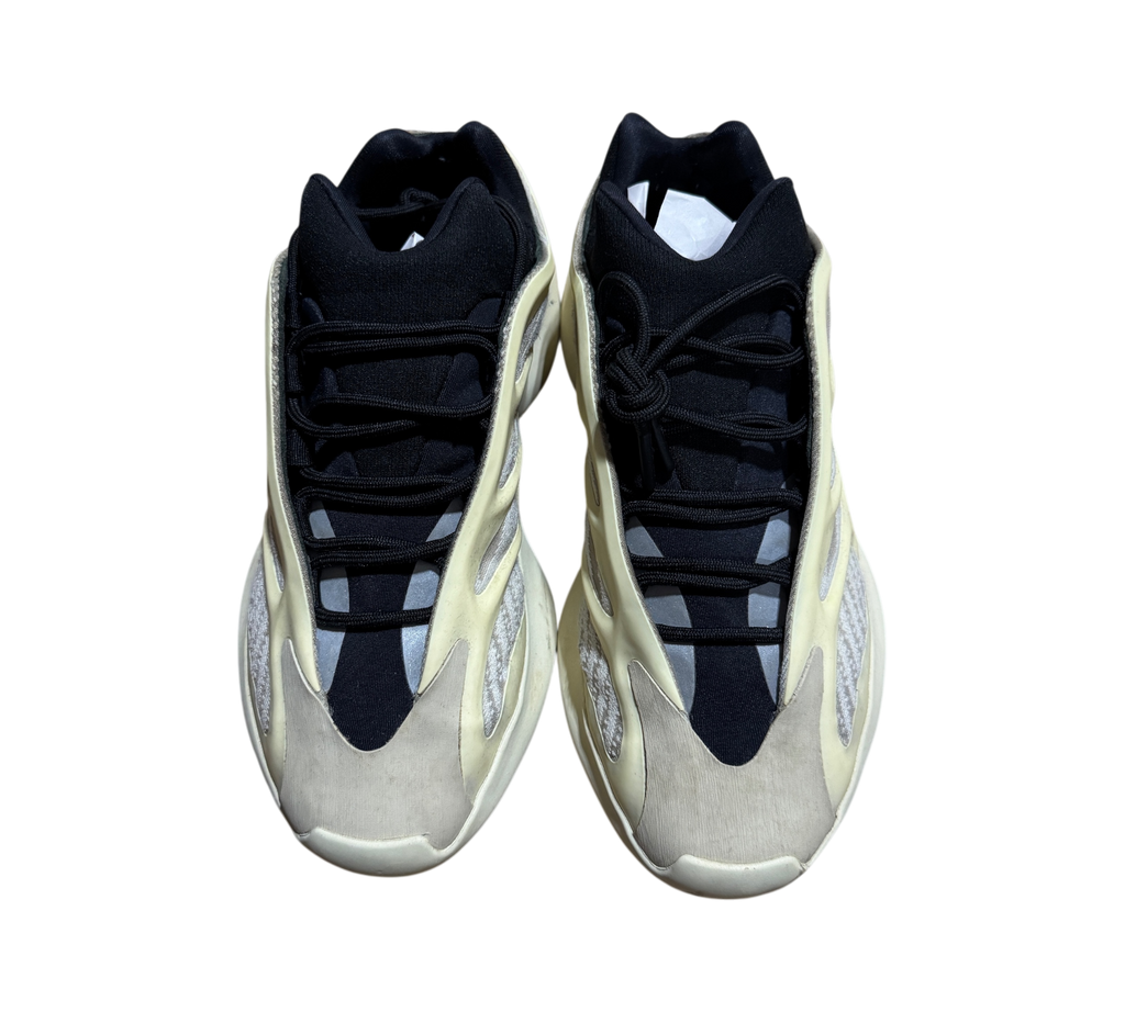 Genesis Boutique pre-owned Yeezy 700 Azael sneakers featuring a cream-colored cage and black mesh upper