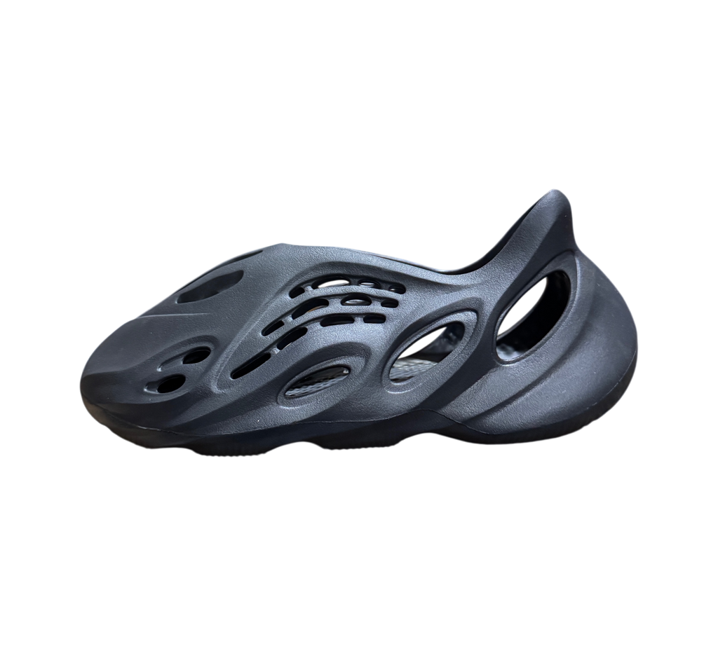 Genesis Boutique Yeezy Foam Runner Onyx slip-on shoe in matte black foam with signature oval cutouts
