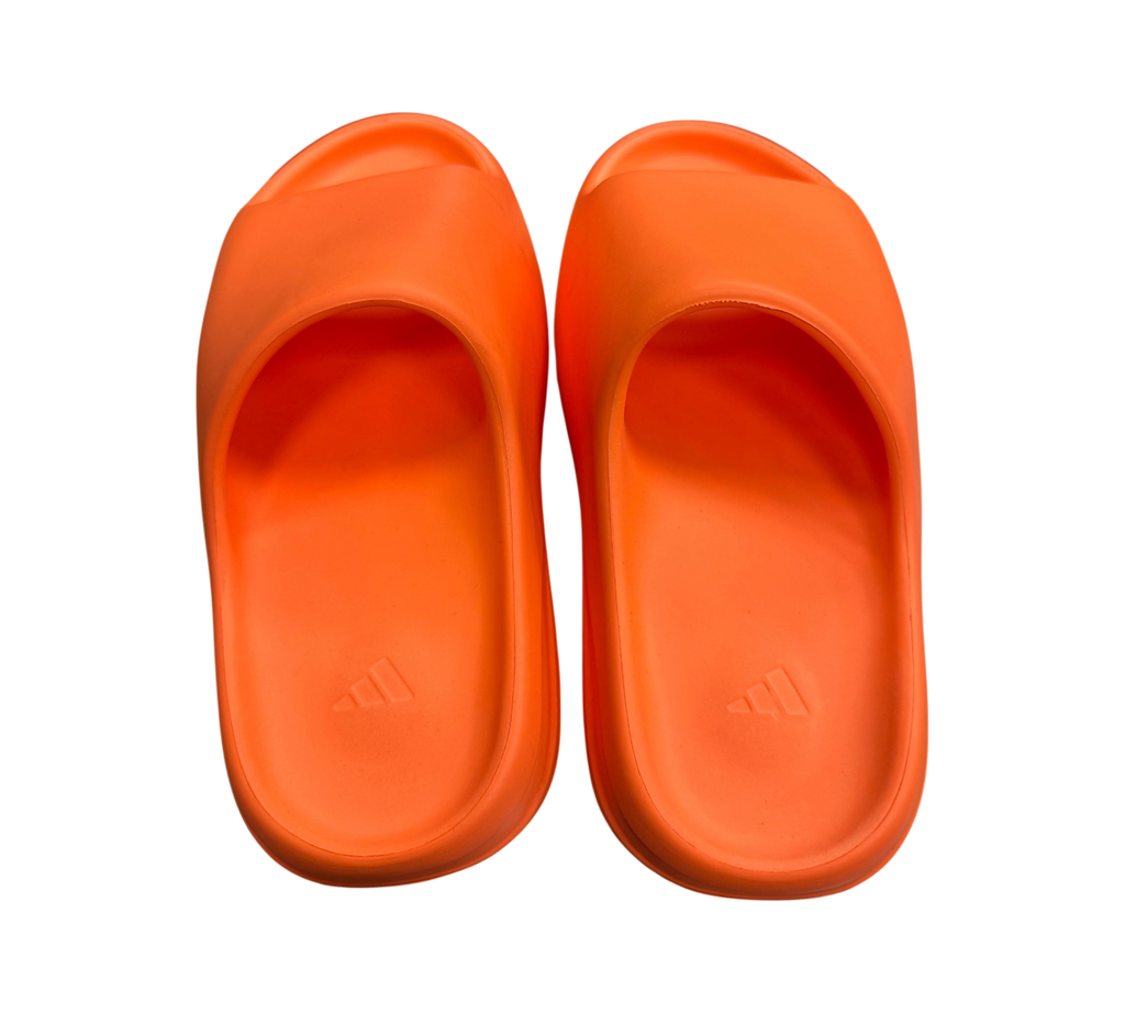 Genesis Boutique Yeezy Slide Enflame Orange foam sandals with embossed Adidas logo on footbed