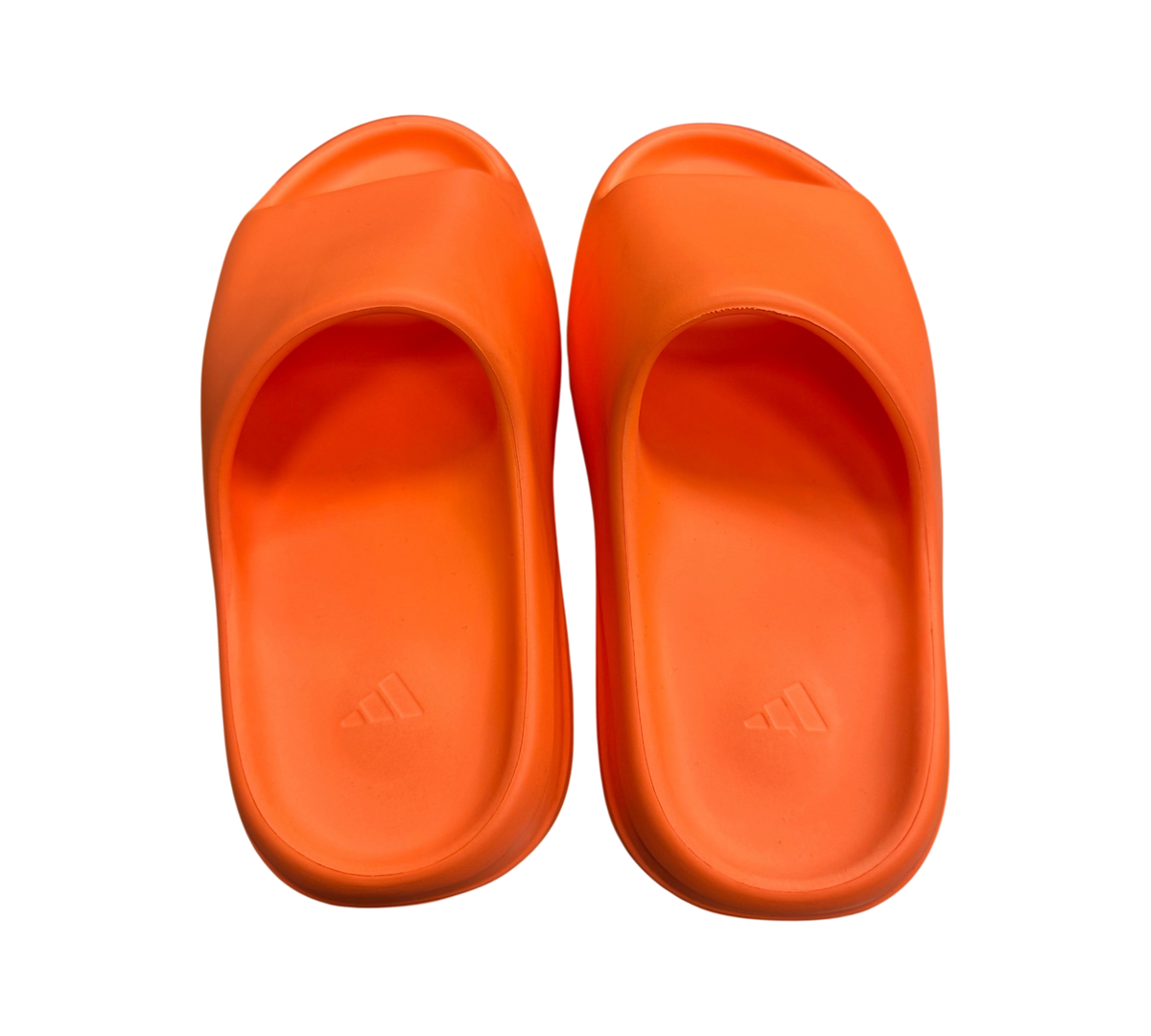Genesis Boutique Yeezy Slide Enflame Orange foam sandals with embossed Adidas logo on footbed